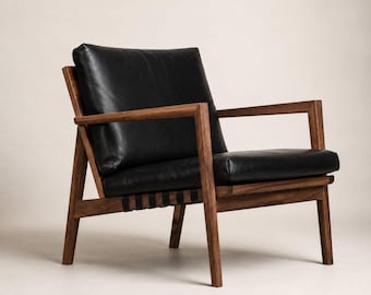 Poltrona lounge in legno di noce realizzata a mano, poltrona in pelle nera, poltrona d'accento in stile moderno di metà secolo, poltrona da soggiorno scandinava
