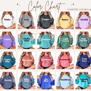May include: A color chart for Comfort Colors 1566 sweatshirts displaying twenty different color options including white, grey, pepper, butter, orchid, violet, chalky mint, seafoam, light green, blue spruce, topaz blue, terracotta, crimson, watermelon, true navy, denim, blue jean, flo blue, chambray, and lagoon blue.