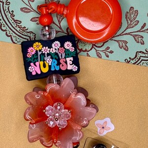 Nurse with Fancy Flower Beaded Badge Reel