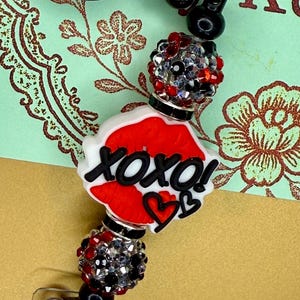 XOXO Lips Beaded Badge Reel