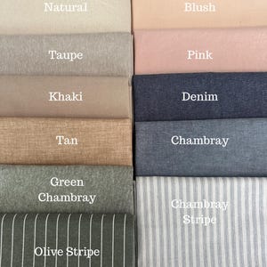 May include: A collection of fabric swatches in various colors, including natural, taupe, khaki, blush, pink, denim, tan, chambray, green chambray, olive stripe, and chambray stripe. Each swatch is labeled with its color name in white text.