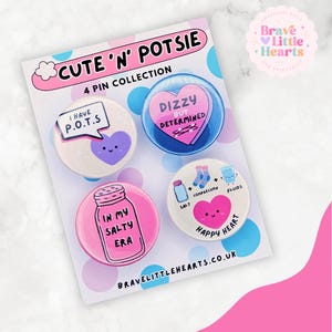 May include: A collection of four round pin badges with the text "CUTE 'N' POTSIE" and "4 PIN COLLECTION". Each badge has a unique design, including phrases such as "I HAVE P.O.T.S" and "IN MY SALTY ERA". The badges are in shades of pink, blue, and white.