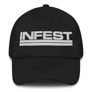 May include: Black baseball cap with the word "INFEST" embroidered in white block letters. Two white horizontal lines are embroidered below the word. The cap has a curved brim and a button on top.