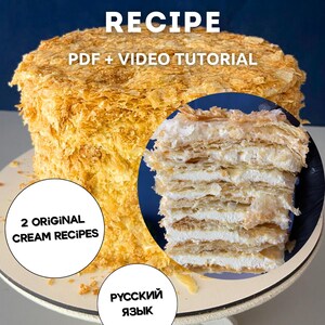 May include: A layered Napoleon cake with a flaky, golden-brown crust and creamy filling, presented on a white cake stand. Text on the image reads "Napoleon Cake Recipe PDF + Video Tutorial", "2 Original Cream Recipes", and "Russian Language".