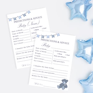 May include: Two white baby shower prediction and advice cards with blue text and banner illustrations. The cards have fill-in-the-blank sections for details like date of birth, weight, and wishes. Blue star-shaped balloons are scattered around.