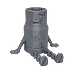 May include: A grey 3D-printed socket wrench with arms and legs, giving it a cartoon-like appearance. The wrench is labelled "10mm" and features a logo. The arms and legs are articulated, and the wrench is sitting down.