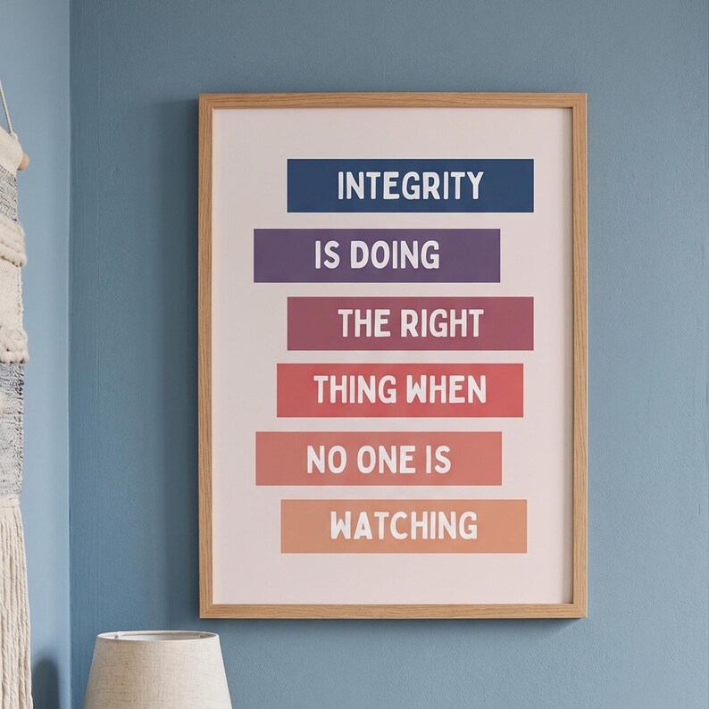 print with the words "INTEGRITY IS DOING THE RIGHT THING WHEN NO ONE IS WATCHING." The text is in a sans-serif font, with each line on a different colored rectangular block.