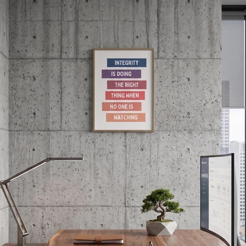 print with the text "INTEGRITY IS DOING THE RIGHT THING WHEN NO ONE IS WATCHING" . The print has colorful text blocks.