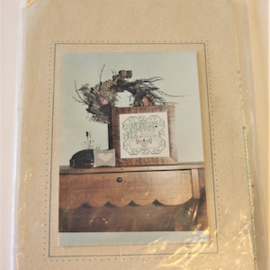 Cross Stitch Pattern: A Rosebud Sampler Cross Stitch Pattern with Floss