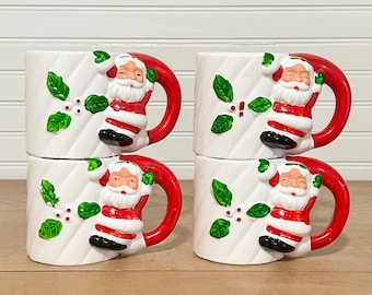 Set of 4 vintage Santa face handle Christmas mugs