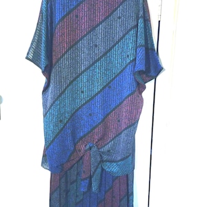 Vintage 1980s batwing pleated avant-garde midi dress. Vintage Clothing by VintageTwists.