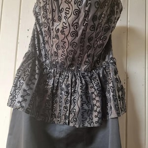 Vintage 1980s black peplum evening midi dress. Vintage Clothing by Vintagetwists