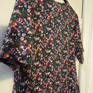 Vintage 1980s pink and green floral drop waist day dress. Vintage Clothing by VintageTwists.