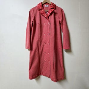 Vintage 1960s red with white polka dots double breasted coat dress. Vintage Clothing by VintageTwists.