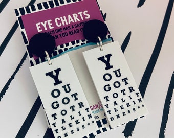 You got to try a little kindness. Snellen eye chart earrings, traditional white with black letters, be kind, optometrist gift eye doctor