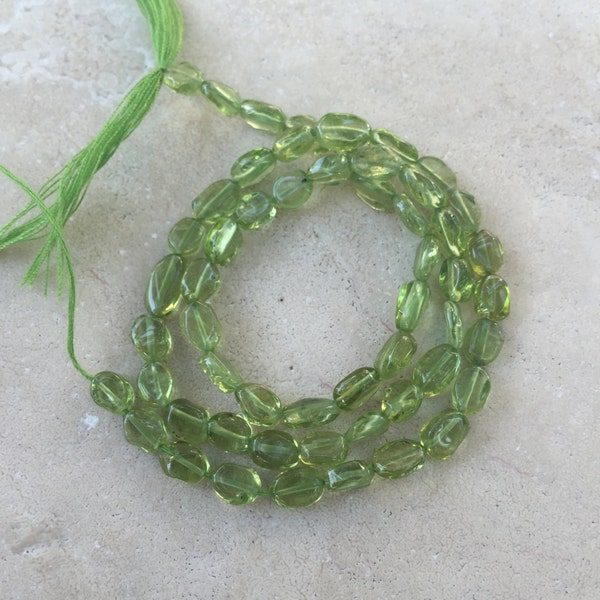 Peridot Oval Beads, Peridot Beads, smooth, 13 inch strand, 5 to 7mm approx.