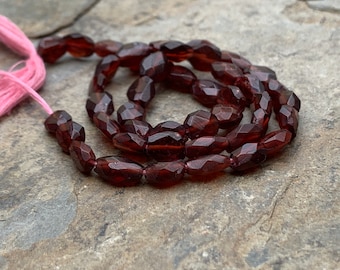 Faceted Garnet Oval Beads, 7.5 x 6mm approx, 13 inch strand