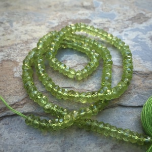 Faceted Peridot Rondelles, 4mm, 16 inch strand