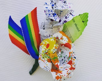 rainbow paint splattered recycled music pages boutonniere buttonhole lapel pin mens groom wedding accessory