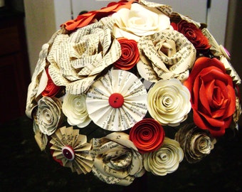 the Cara bridal bouquet in red and wine mixed paper roses, book page roses spiral roses and pinwheel fan folded flowers