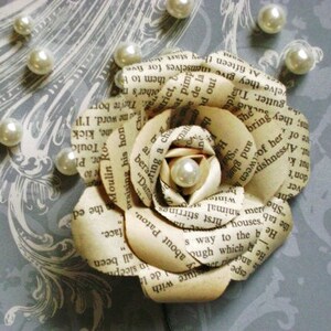 recycled vintage book page paper rose boutonniere buttonhole with pearl center flower for groom wedding