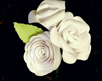 all white paper rose boutonniere corsage lapel pin buttonhole wedding flowers