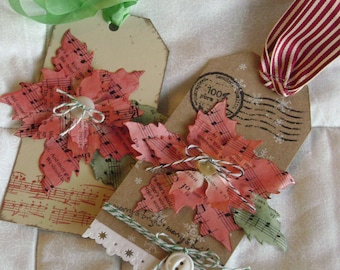 Kraft Christmas tags with sheet music poinsettias and button centers with baker's twine accent