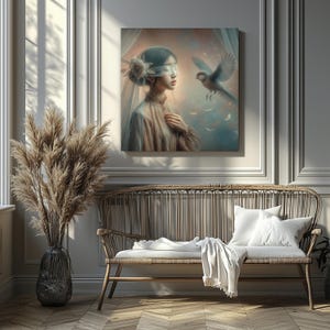 May include: A framed artwork depicts a woman with a blindfold and a bird in flight. The woman wears a light-colored dress and veil, with a flower in her hair. The background is a soft blend of colors, with a hint of stars.