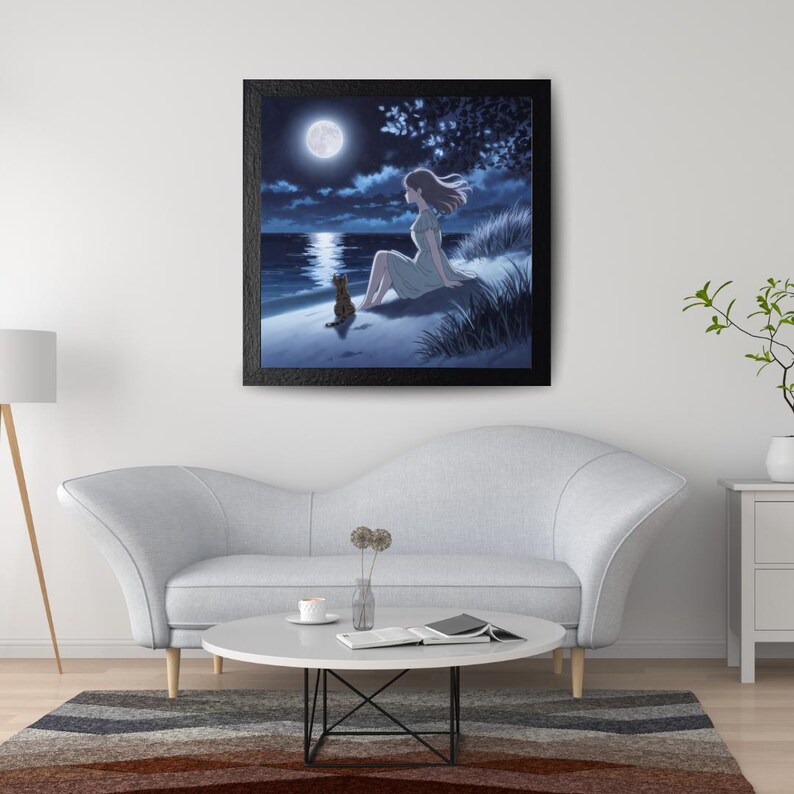 May include: Framed art print showing a tranquil night scene. A woman and a cat are seated by the water, observing the full moon. The artwork features a dark blue sky, water, and a sandy shore, creating a peaceful atmosphere.
