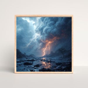 May include: A framed print depicts a dramatic landscape with a stormy sky. Intense lightning bolts illuminate the dark, cloudy sky above a body of water and rocky terrain. The artwork is encased in a light-colored wooden frame.