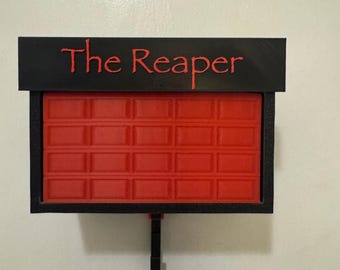 Atriculating garage door key hanger (with customized banner)