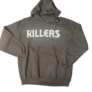 May include: A rustic wooden sign with the text "Welcome to our home" in a handwritten style. The sign features a distressed finish and a simple, inviting design, perfect for a front porch or entryway.