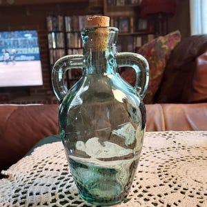 Green Glass Decorative Bottle Jar or Vase Handles and Thick Heavy Glass