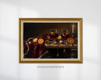 May include: A framed print of a still life featuring two glasses of mulled wine with orange slices. The scene includes a lit candle, cinnamon sticks, and a red velvet cloth. The text "STUDIOINKPRINTS" is at the bottom.