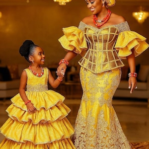 Mom and daughter matching clothes,Matching African family outfits,Family cultural wear,George lace family sets,Custom made African clothing.