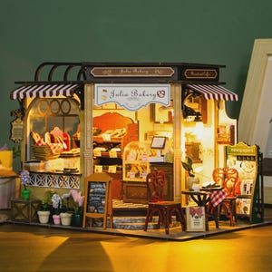 Julia’s Bakery Mini Dollhouse Kit – DIY Wooden 3D Puzzle with Furniture, Assembly Craft Gift for Kids - Mini Shelf Insert Book Nook