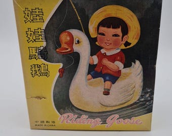 Vintage Reitgans Aufziehspielzeug aus Blech mit Box