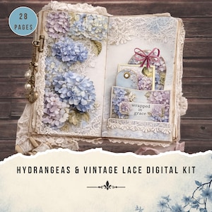 May include: Open journal with hydrangea and lace designs. The pages feature blue and purple floral arrangements and lace trim. The text "wrapped in grace" is visible on a tag. The journal has 28 pages and is part of a digital kit.
