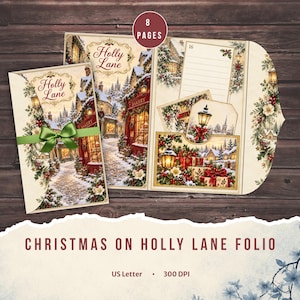 Pode incluir: Um fólio Christmas on Holly Lane de 8 páginas com cenas de vilas de inverno, uma padaria e postes de luz. O conjunto inclui um cartão dobrado com uma fita verde, espaço para escrita com linhas e etiquetas decorativas com imagens festivas.