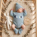 Personalised Baby Romper with Name \u2022 Newborn Coming Home Outfit \u2022 Baby Shower Gift product logo