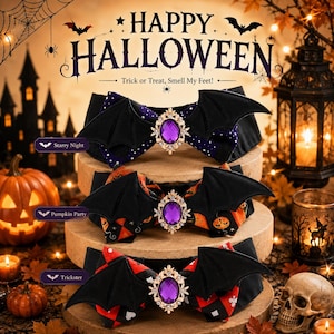 May include: Three bow ties featuring black bat wings and a central oval purple gemstone in a gold-tone setting. The top bow has a starry night pattern, the middle has a pumpkin print, and the bottom has a red and black diamond pattern.