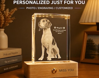 May include: A personalized crystal engraving featuring a dog portrait, illuminated by embedded lights. The crystal sits on a wooden base with the text "MISS YOU". The image also includes the text "CRYSTAL ENGRAVING PERSONALIZED JUST FOR YOU".