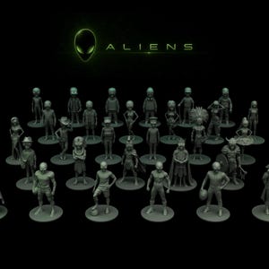May include: A group of grey figurines of diverse characters, each on a circular base. The word "ALIENS" is displayed in green above the figurines, with a green alien head logo. The background is black.