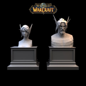 May include: Two white busts of characters from World of Warcraft, a female and a male, each on a gray pedestal. The male bust has a beard and long hair. The World of Warcraft logo is visible in the background.