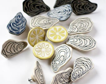 Ręcznie robione ceramiczne gałki do szafek – muszla ostrygi przybrzeżnej i cytryna