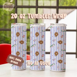 May include: Three 20 oz tumblers featuring a repeating pattern of pancakes, syrup bottles, and green sneakers on a light blue and white vertical striped background. The text 20 oz Tumbler Wrap, 100% Hand Drawn, and No AI Used is visible.