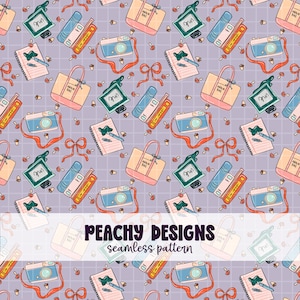 May include: A seamless pattern featuring illustrations of cameras, tote bags, notebooks, ink bottles, and bows in a repeating design. The color palette includes shades of pink, blue, and orange on a lavender grid background. The text "PEACHY DESIGNS seamless pattern" is displayed.
