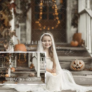 May include: A young girl wearing a white dress and veil sits on a porch with a jack-o-lantern and pumpkins. The porch is decorated with fall leaves and lights.