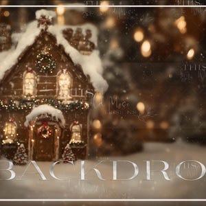 May include: A festive Christmas backdrop featuring a gingerbread house with snow-covered roof and decorative lights. The house is adorned with wreaths and garlands, creating a warm, inviting scene. The word "BACKDROP" is displayed at the bottom.