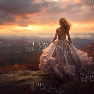 May include: A young woman in a long, flowing, light purple and gold dress stands on a rocky cliff overlooking a mountain range at sunset. The sky is a vibrant orange and pink, and the mountains are covered in a hazy mist.